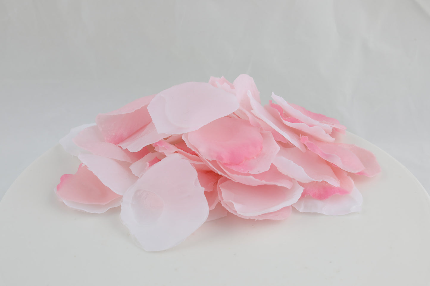 soap shaped as flower petals in white and light pink