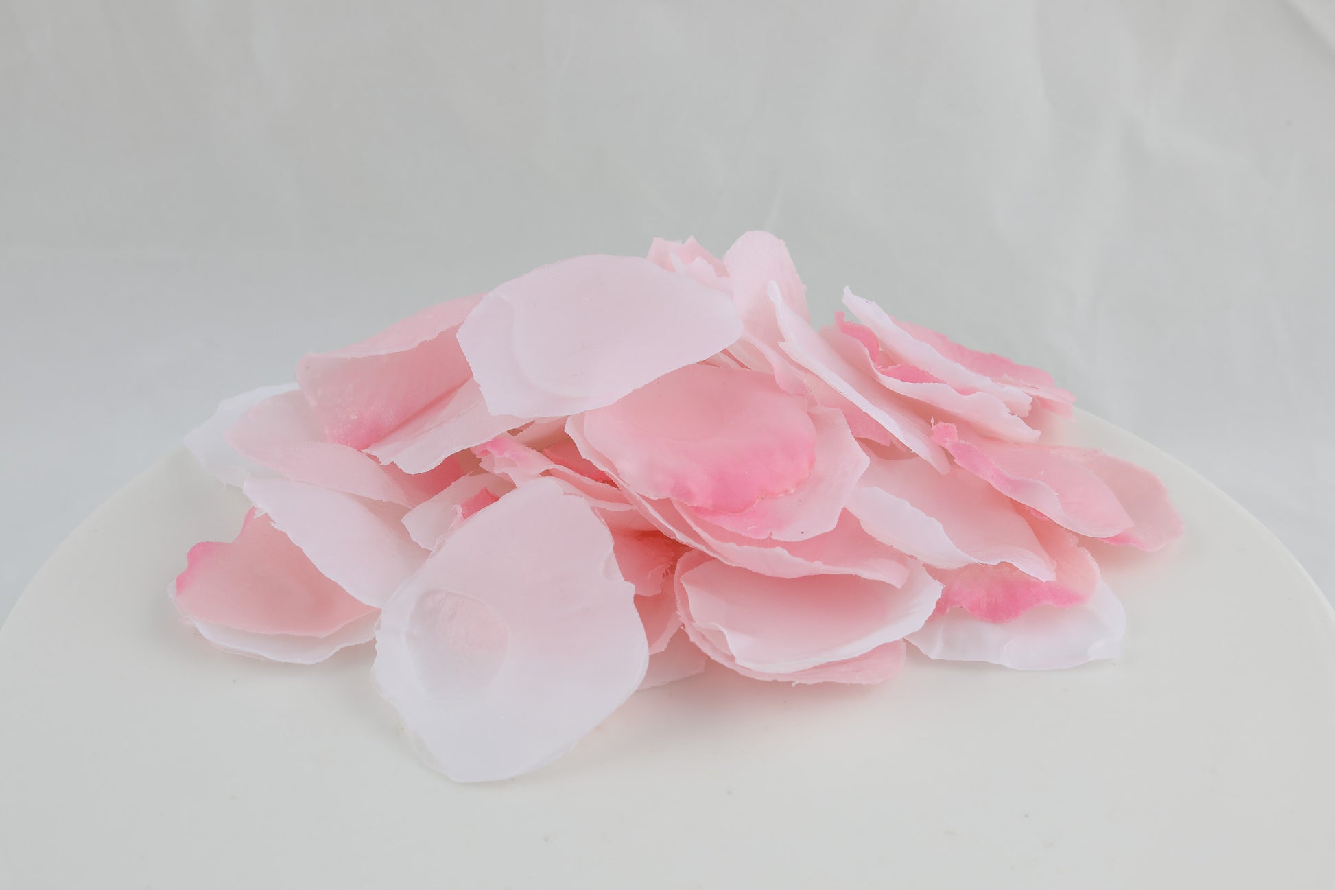 soap shaped as flower petals in white and light pink