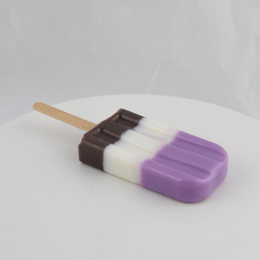 popsicle shaped soap with brown, white, and purple colors