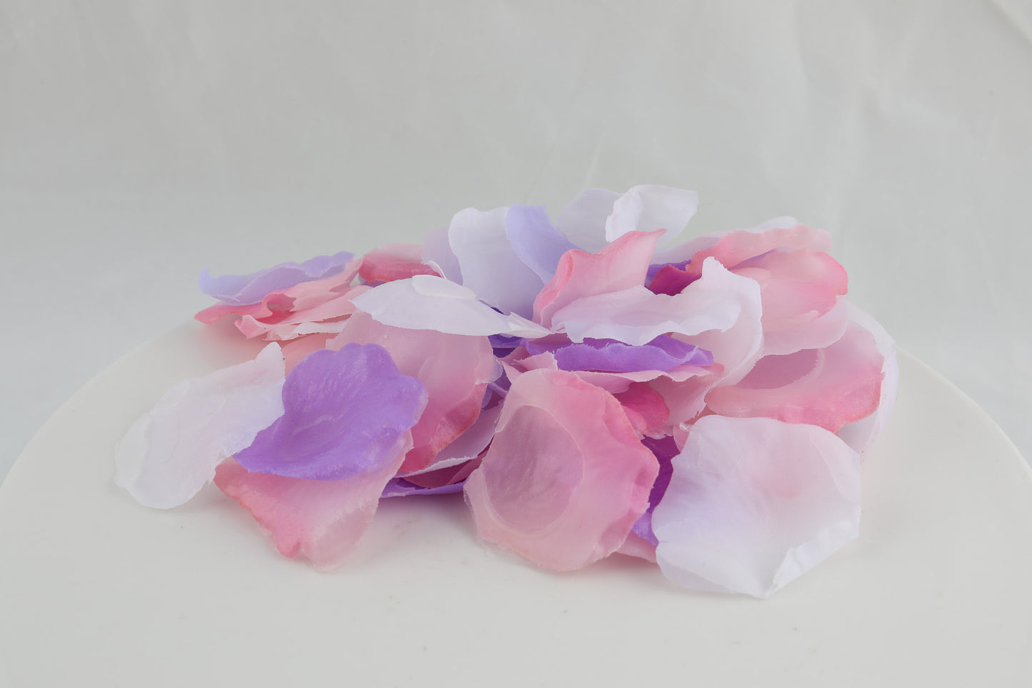 soap shaped as flower petals in pink purple and white