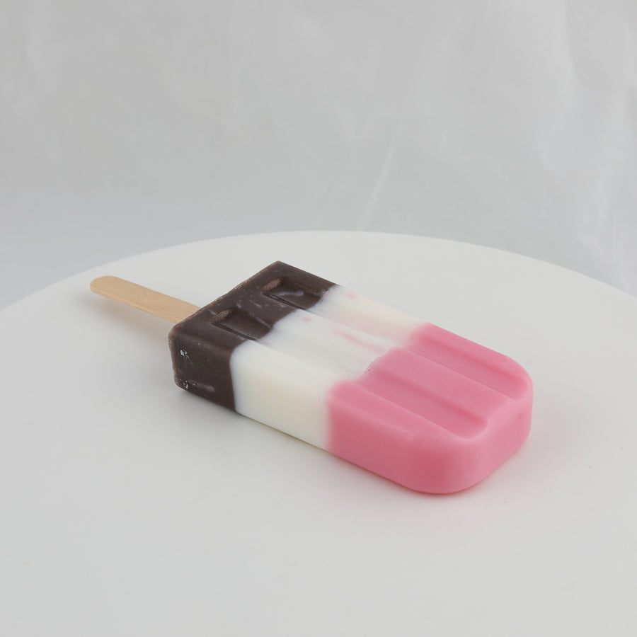 popsicle shaped soap with brown, white, and pink colors