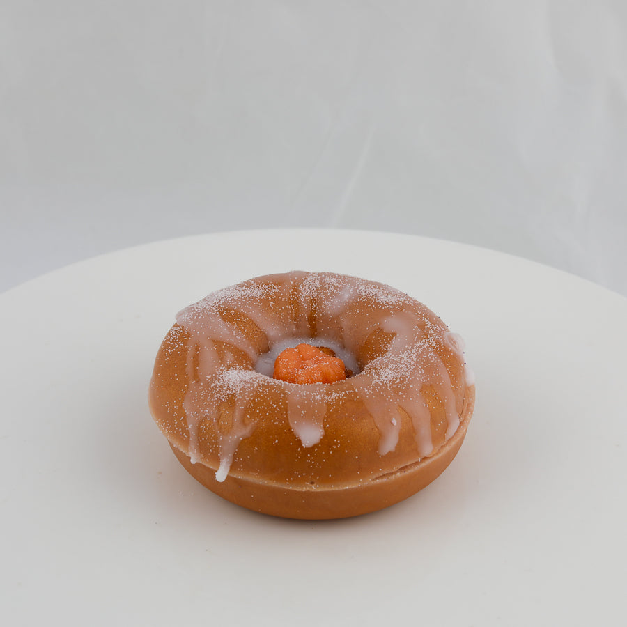 donut shaped soap with a small pumpkin in the center