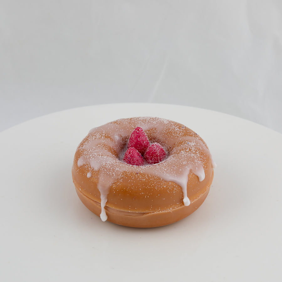 donut shaped soap with raspberries in the center