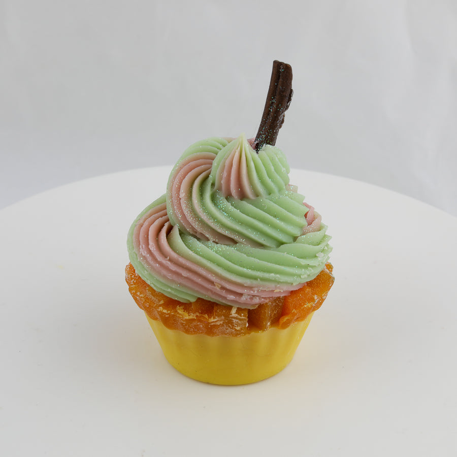 yellow, orange, green, and pink colored cupcake shaped soap with a brown stem on top