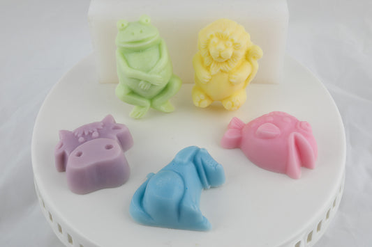 colorful soap shaped as frogs, lions, fish, dogs,, and a hippo