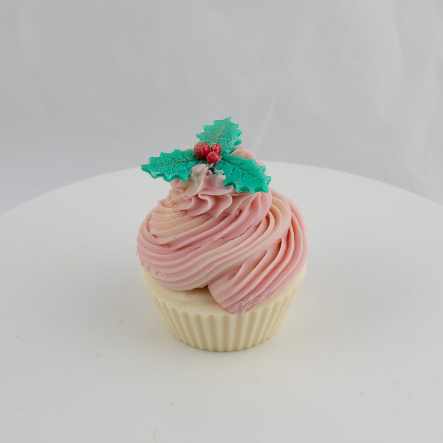 cream and pink, cupcake shaped soap with green holly leaves and red berries on top